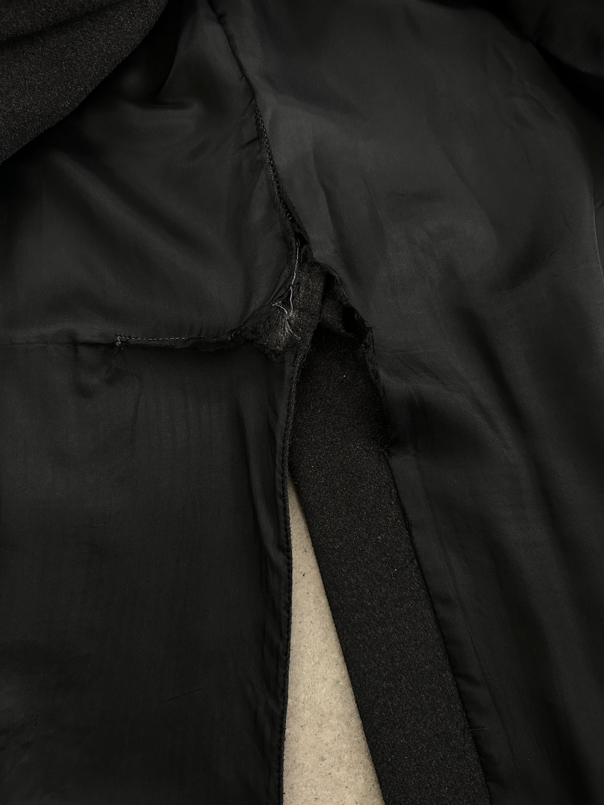 Vintage 1990s wool cashmere high neck belted coat, size L, featuring a classic design and warm, textured fabric.