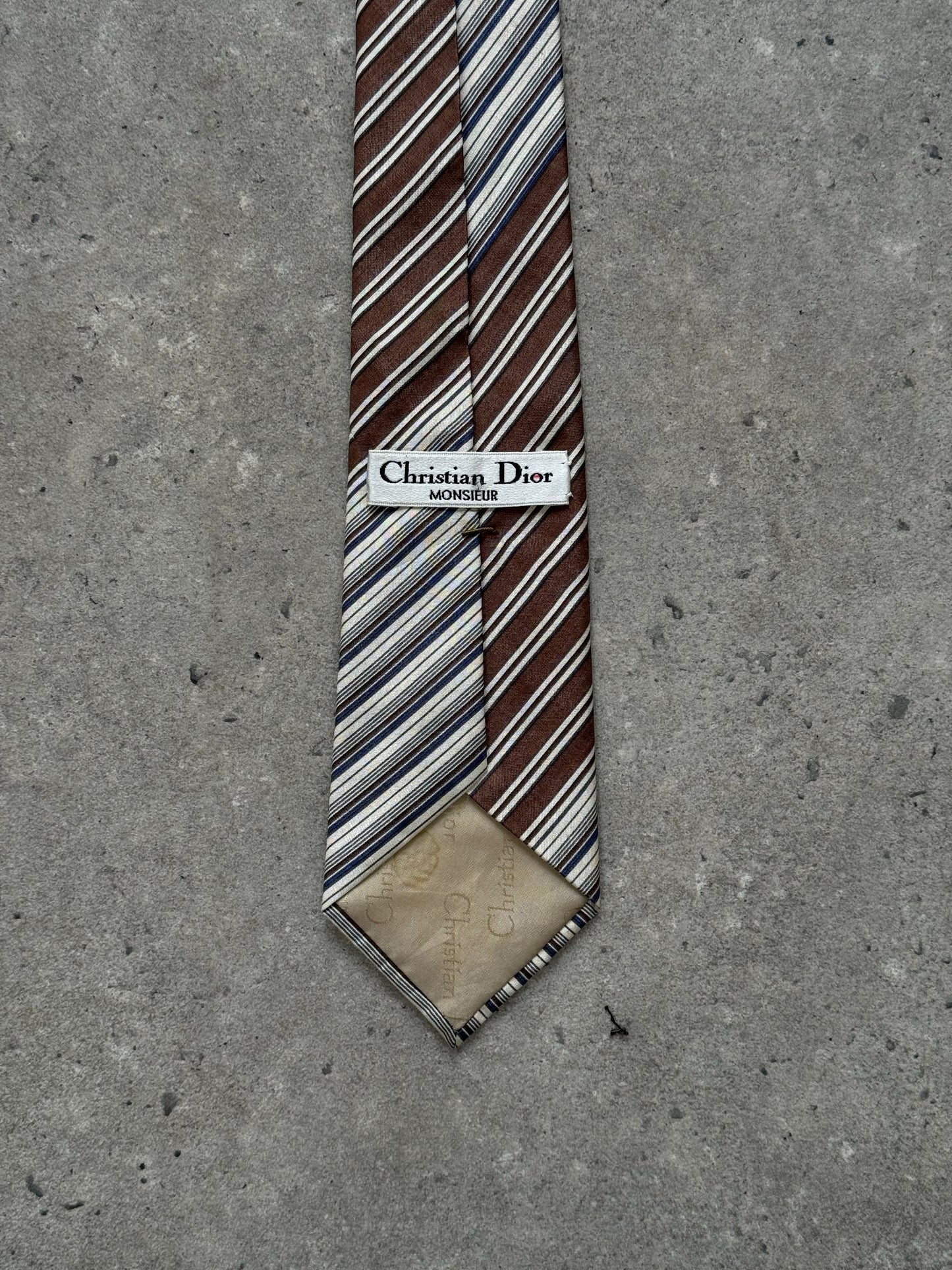 Christian Dior Monsieur 1990s silk striped tie, elegant men's accessory with blue and white pattern, made of high-quality silk fabric.