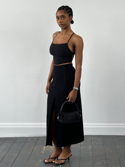 Jaeger 1990s pure wool side split maxi skirt in W24, showcasing a long, elegant wool skirt with side slit detail.