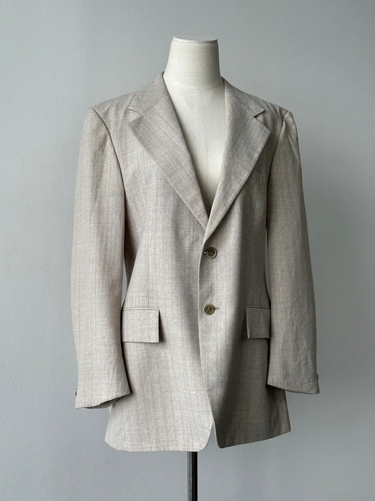 Yves Saint Laurent 1980s wool stripe single-breasted blazer in size M, featuring classic tailored fit and bold stripe pattern.