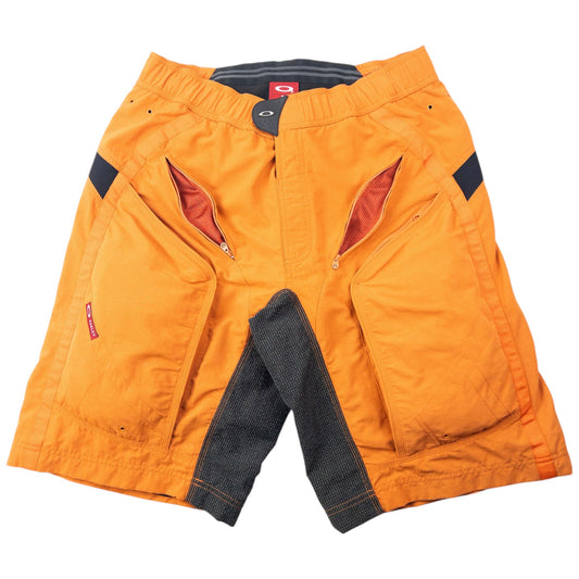 Vintage 90s Oakley Padded Cycling Shorts Size L | Large, Orange