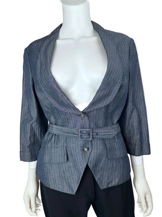 A blue-gray pinstriped wrap jacket with a belted waist and front pockets, displayed on a white mannequin torso with black trousers against a plain light background.