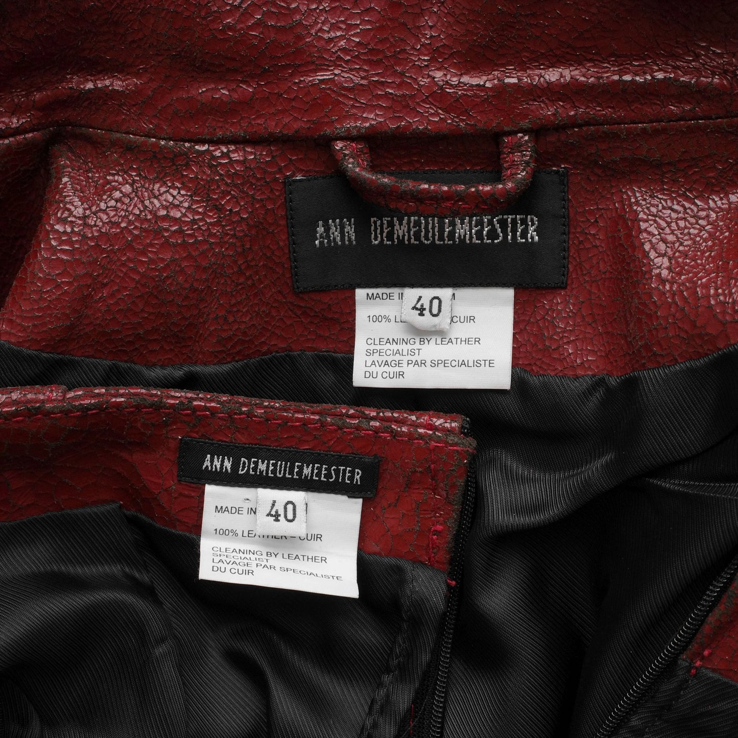 https://images.squarespace-cdn.com/content/v1/673cad159307f210013ba2f7/4211bf5a-9032-4fde-b654-fbbf74d9dcb3/AnnDemeulemeester_FW2001_RedPaintedLeatherSet_6.jpg