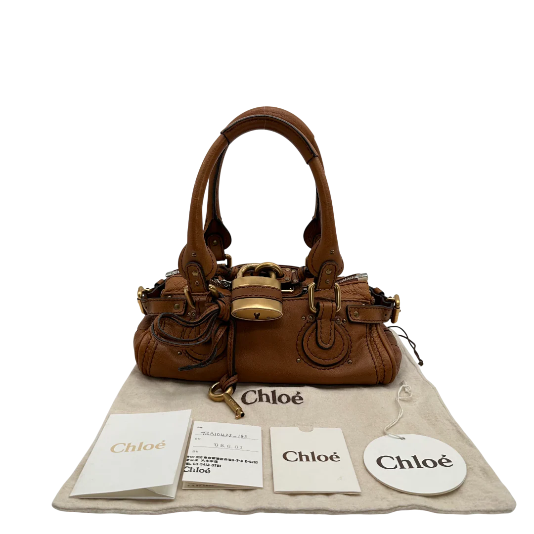 https://cdn.shopify.com/s/files/1/0564/9376/8855/files/Chloe_Handtasche_Paddington_mini_aus_Leder_braun_vintage_2225.webp?v=1769739348