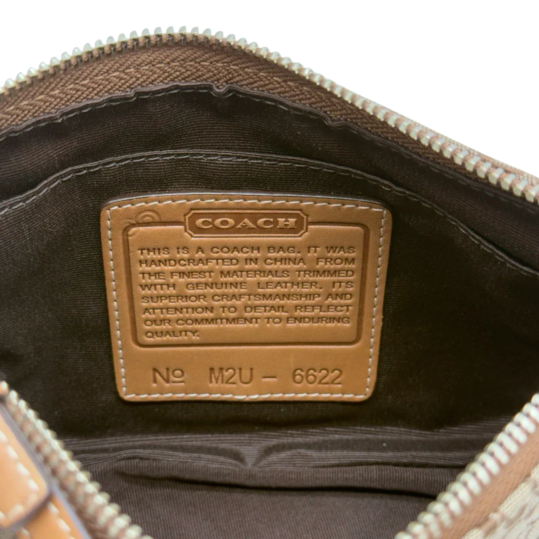 https://cdn.shopify.com/s/files/1/0564/9376/8855/files/Coach_Pochette_Mini_Signature_beige_18.webp?v=1784128022