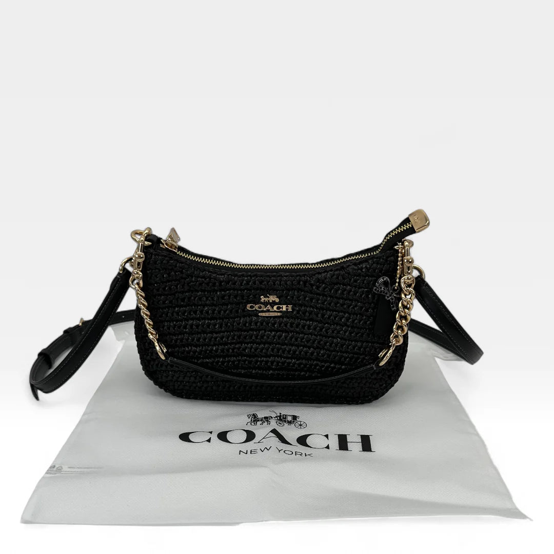 https://cdn.shopify.com/s/files/1/0564/9376/8855/files/Coach_Schultertasche_Baguette_Form_schwarz_shoulder_bag9566.webp?v=1761266047