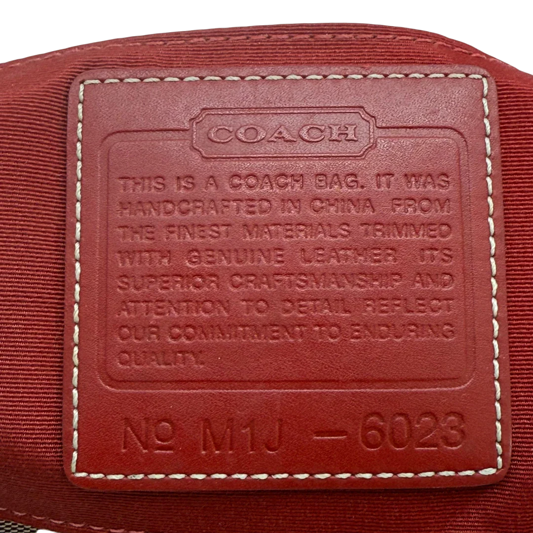 https://cdn.shopify.com/s/files/1/0564/9376/8855/files/Coach_Schultertasche_Signature_rot_vintage4933.webp?v=1776850318