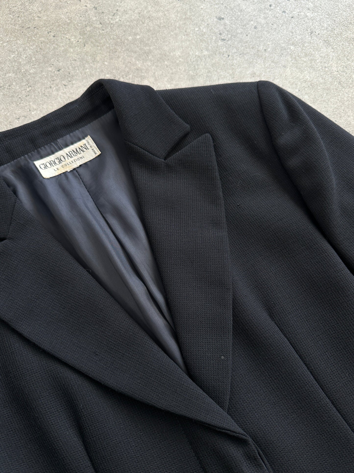 Giorgio Armani Le Collezioni 1990s pure wool single-breasted coat, size small, in classic tailored style, shown on a hanger.