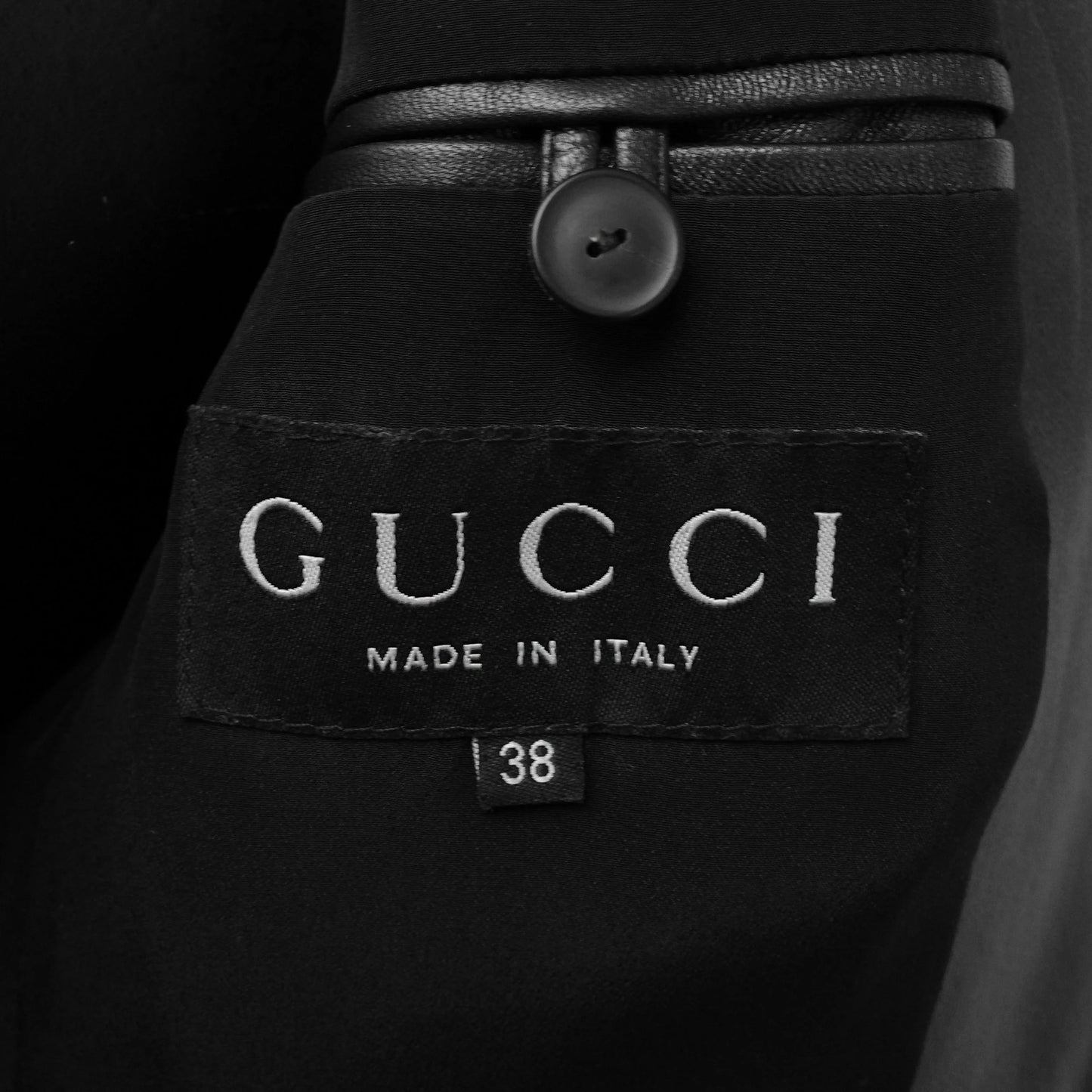 Gucci FW 1997 Tom Ford era leather jacket with metal g buckle closures, structured shoulders and fitted waist. Size IT 38 / UK 6. Available at Artefact Archive.
