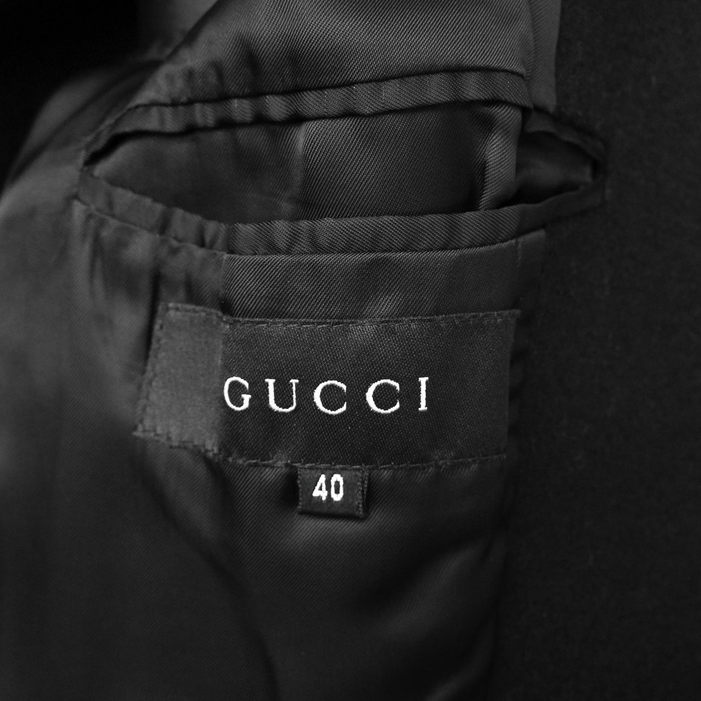 Gucci by Tom Ford FW 1999 runway black wool and cashmere blend coat with a leather rope belt. Size IT 40 / UK 8. Available at Artefact Archive