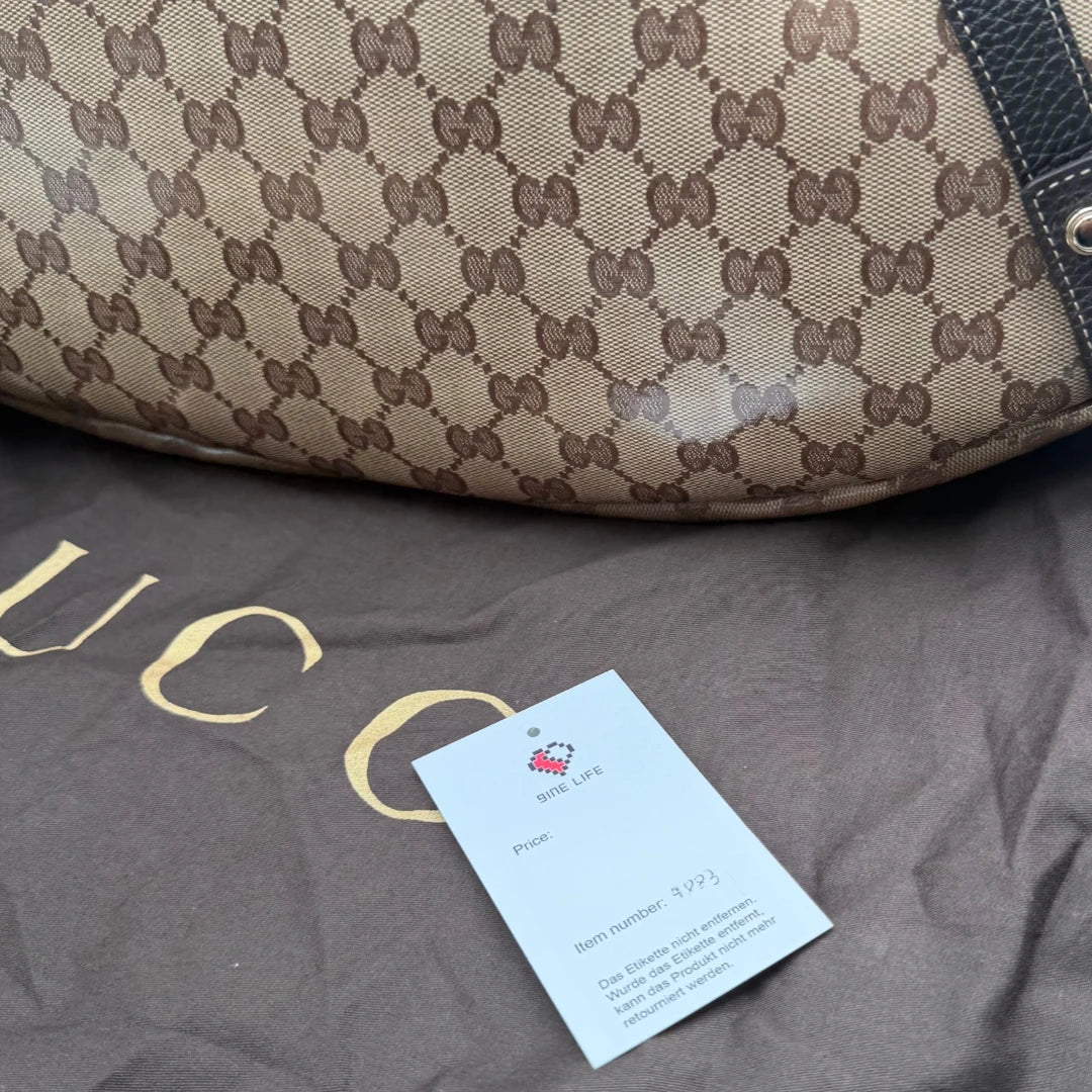 https://cdn.shopify.com/s/files/1/0564/9376/8855/files/Gucci_Handtasche_Abbey_Shopper_PVC_monogram_beige_vintage_GG2889.webp?v=1774020898