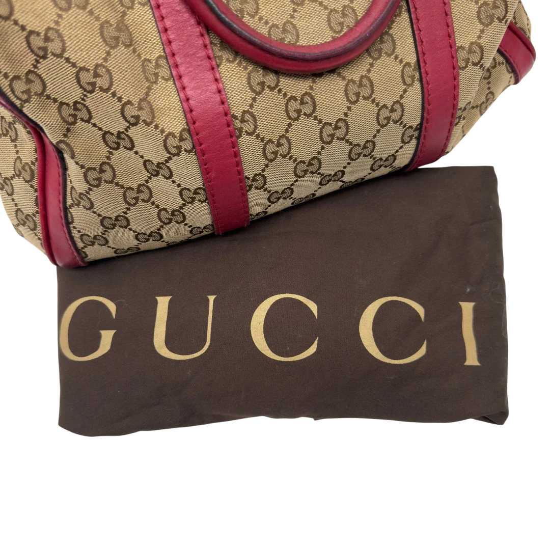 https://cdn.shopify.com/s/files/1/0564/9376/8855/files/Gucci_Handtasche_Boston_Bag_mit_Umhangegurt_monogram_beige_26.webp?v=1782909009