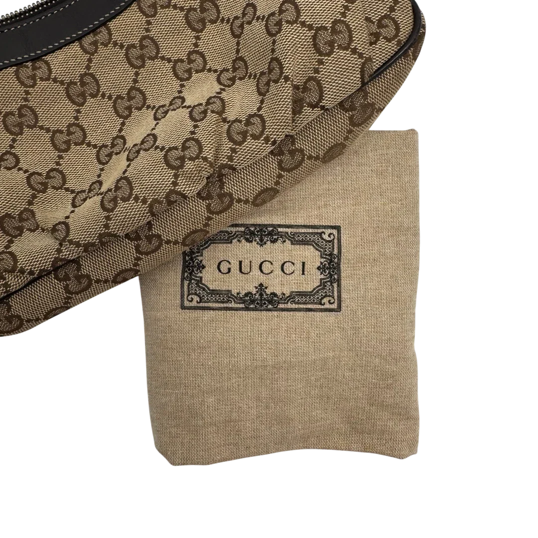 https://cdn.shopify.com/s/files/1/0564/9376/8855/files/Gucci_Pochette_Lovely_mit_GG_Herz_monogram_beige_vintage_GG2387.webp?v=1779966529