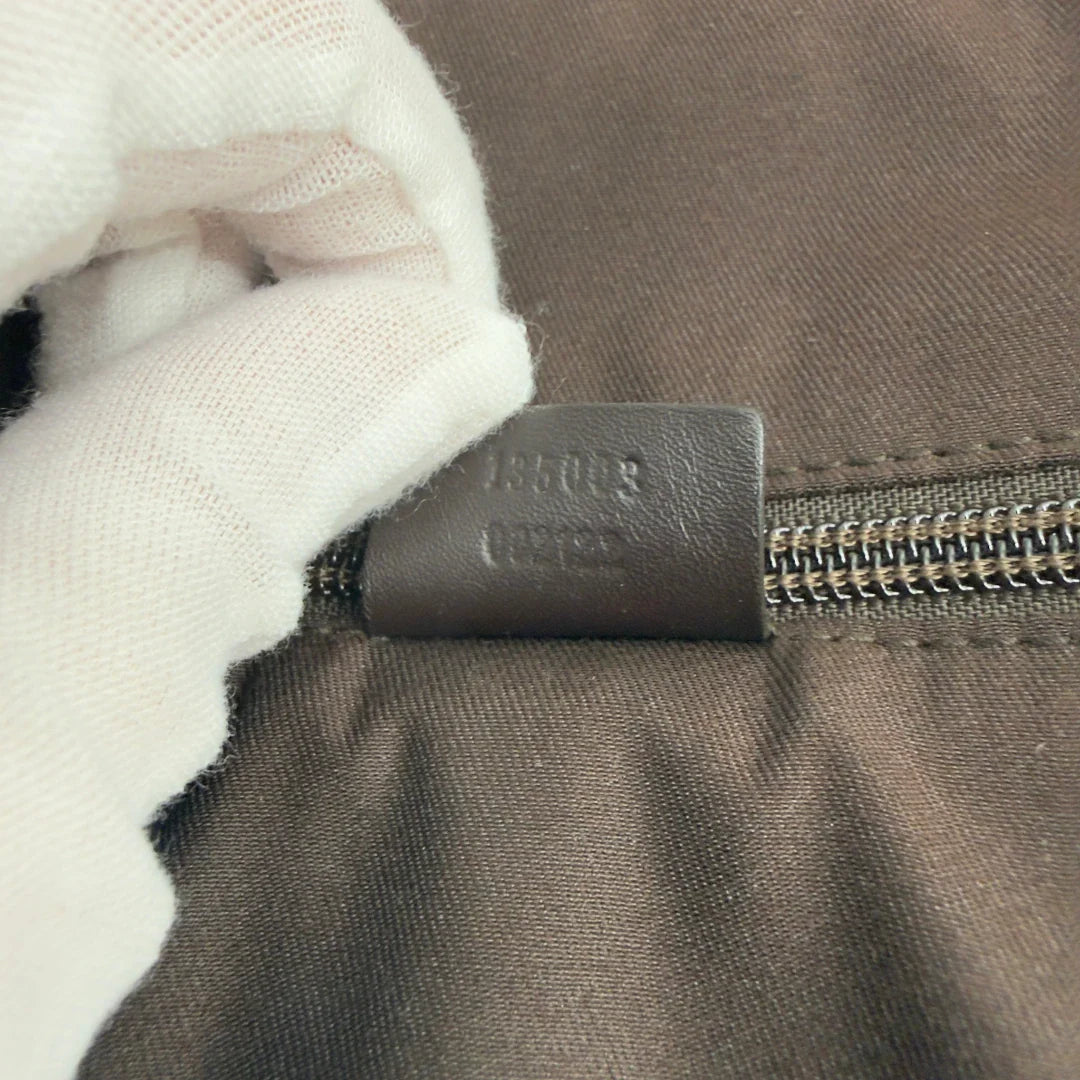https://cdn.shopify.com/s/files/1/0564/9376/8855/files/Gucci_Reisekoffer_Sherry_Line_monogram_beige_29.webp?v=1783512441