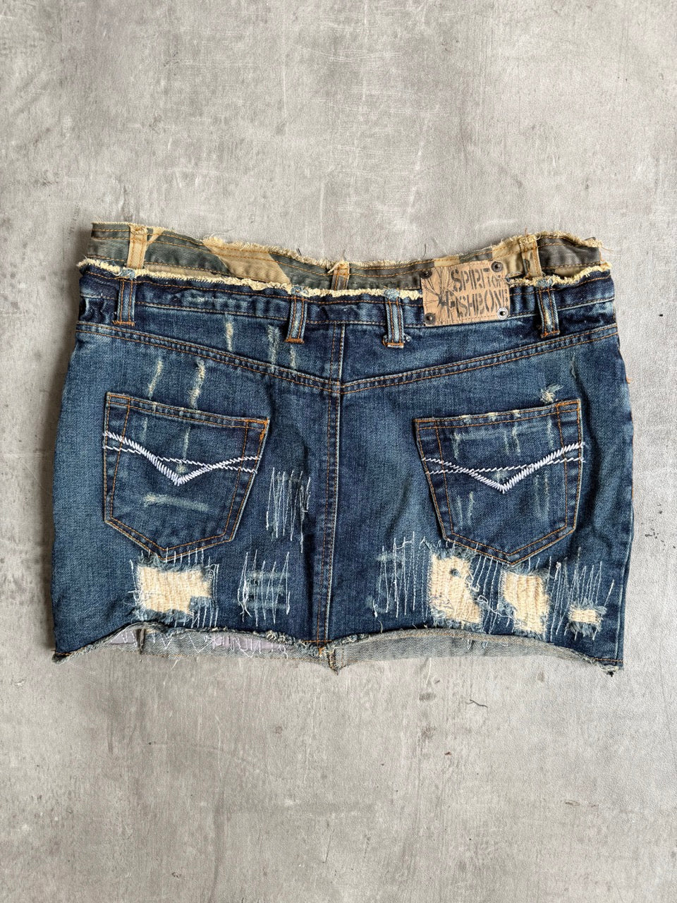 Fishbone Distressed Denim Mini Skirt