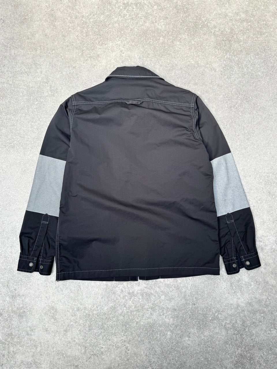 And Wander Multipocket Reflective Sleeve Tech Jacket