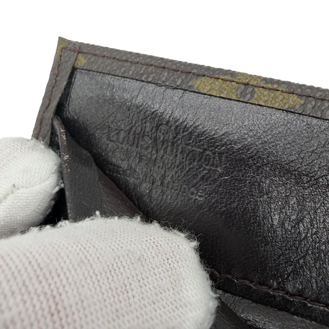 https://cdn.shopify.com/s/files/1/0564/9376/8855/files/Louis_Vuitton_Geldbeutel_Elise_monogram_braun_vintage_LV3873.webp?v=1775051944
