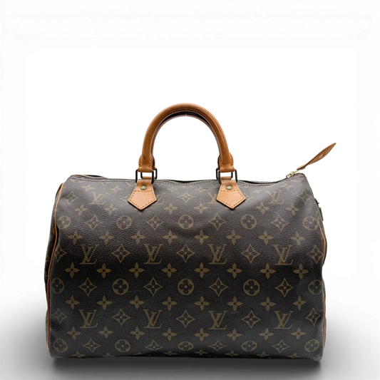 https://cdn.shopify.com/s/files/1/0564/9376/8855/files/Louis_Vuitton_Handtasche_Speedy_30_monogram_braun_vintage_LV_0049.webp?v=1769738074
