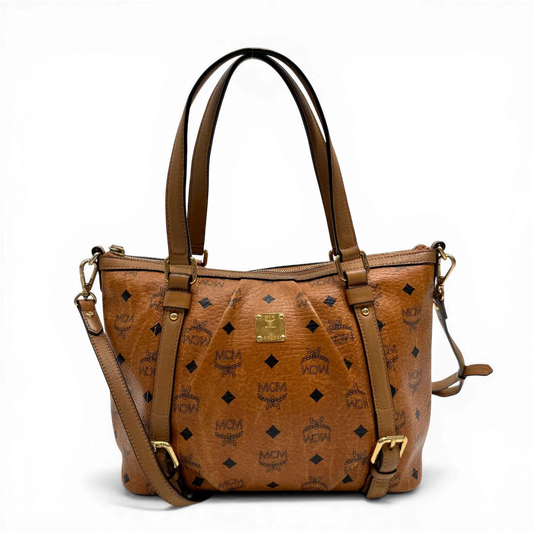 https://cdn.shopify.com/s/files/1/0564/9376/8855/files/MCM_Handtasche_visetos_braun_vintage0147.webp?v=1775725309