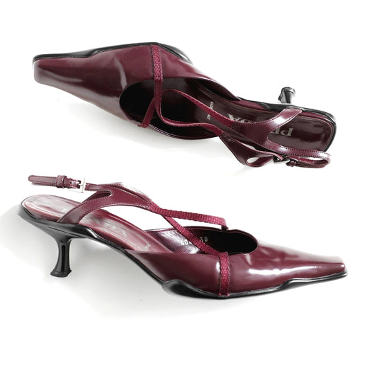 https://images.squarespace-cdn.com/content/v1/673cad159307f210013ba2f7/3cce194f-65c4-440f-a94b-eba96d505e74/Prada_FW2000_LeatherCrissCrossMules_1.jpg