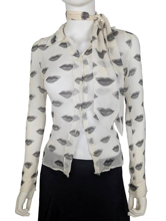 https://cdn.shopify.com/s/files/1/0900/2729/5066/files/Prada_SS_2000_Lips_Print_Top.jpg?v=1776360050