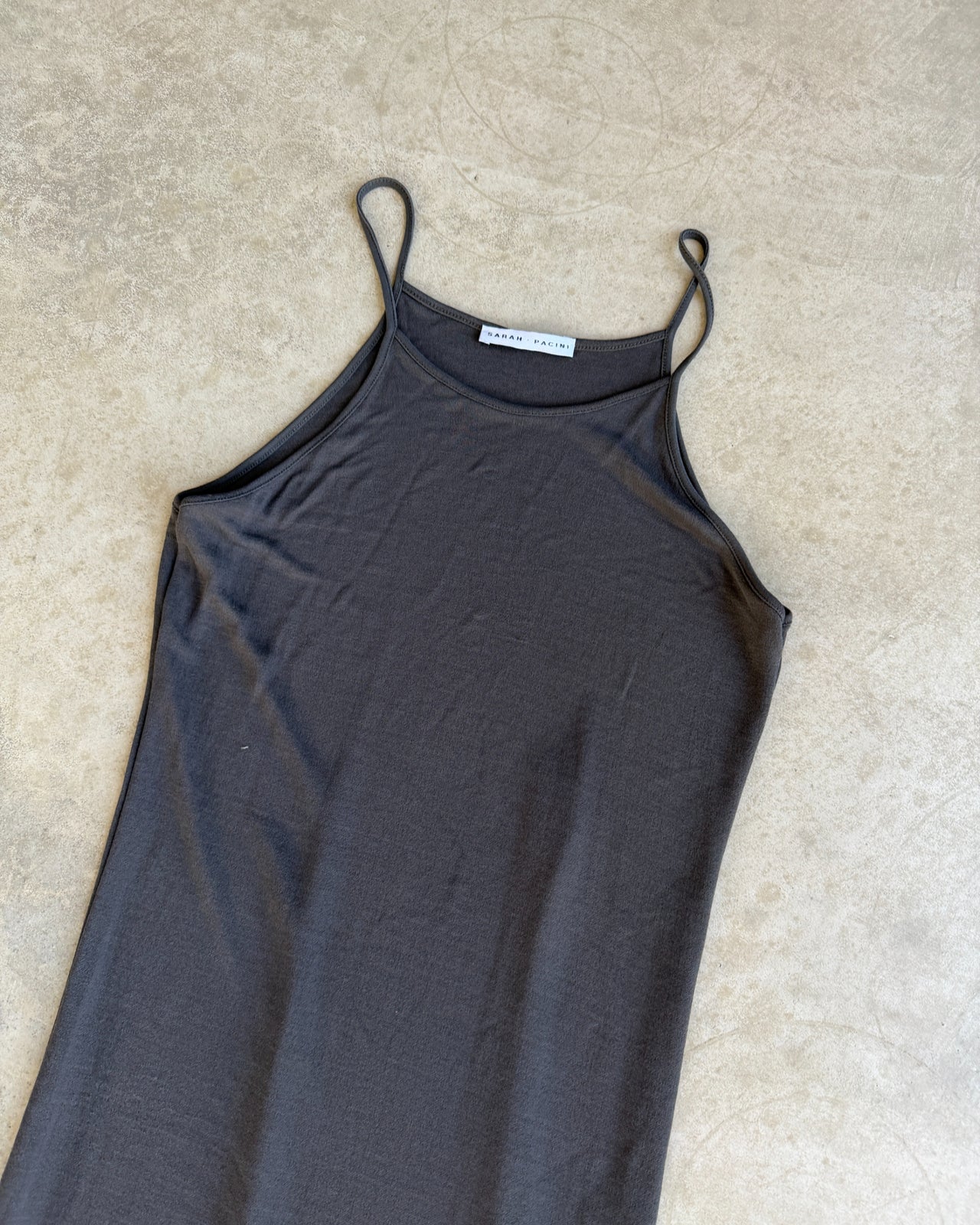 Sarah Paccini Grey Semi Sheer Maxi Dress-on a concrete background