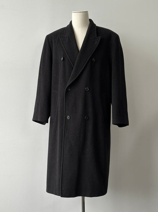 Vintage 1990s pure wool double-breasted coat in size XL, showcasing classic design and textured fabric.