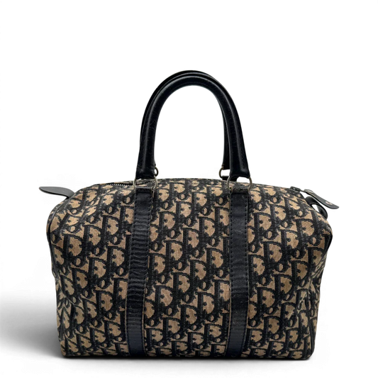 https://cdn.shopify.com/s/files/1/0564/9376/8855/files/dior_boston_30_vintage_monogram_beige_christian_dior_oblique_boston_bag_vintage_dior_handtasche_canvas_beige1767.webp?v=1779406963