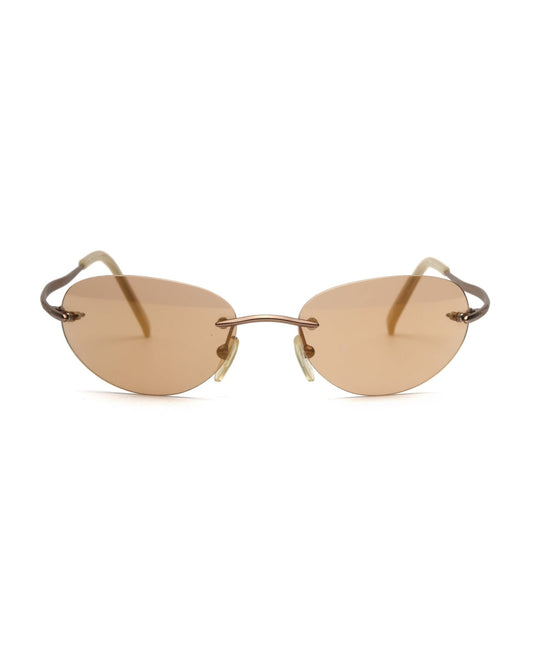 https://cdn.shopify.com/s/files/1/0818/5459/5398/files/guess-guess-rimless-sunglasses-vintage-su357-2242977.jpg?v=1766681208