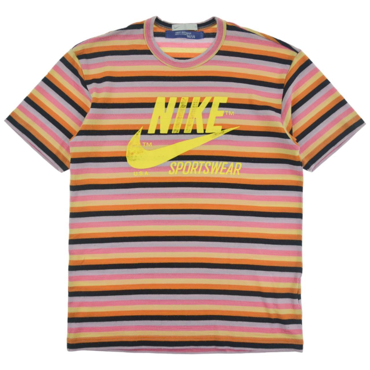 pink yellow nike shirt
