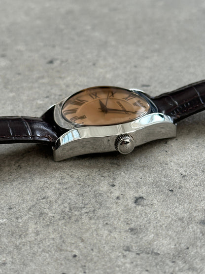 Emporio Armani 2000s leather quartz watch with black strap and silver dial, showcasing classic design and brand logo.