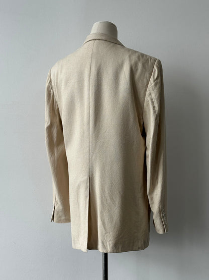 Christian Dior 1980s pure silk single-breasted blazer, navy blue with tailored fit and classic lapel, displayed on a hanger.