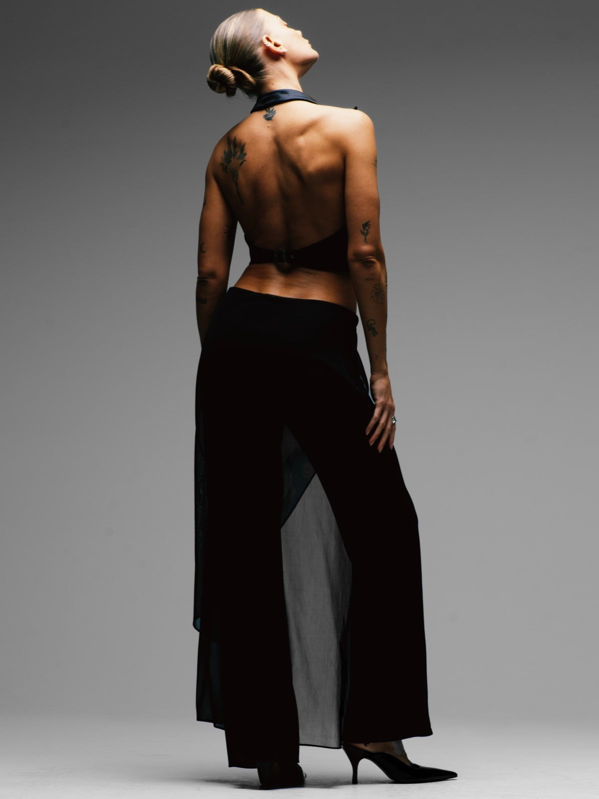Vintage French 1990s sheer overlay wide-leg trousers in size W28, stylish retro women's trousers with flowing fabric.