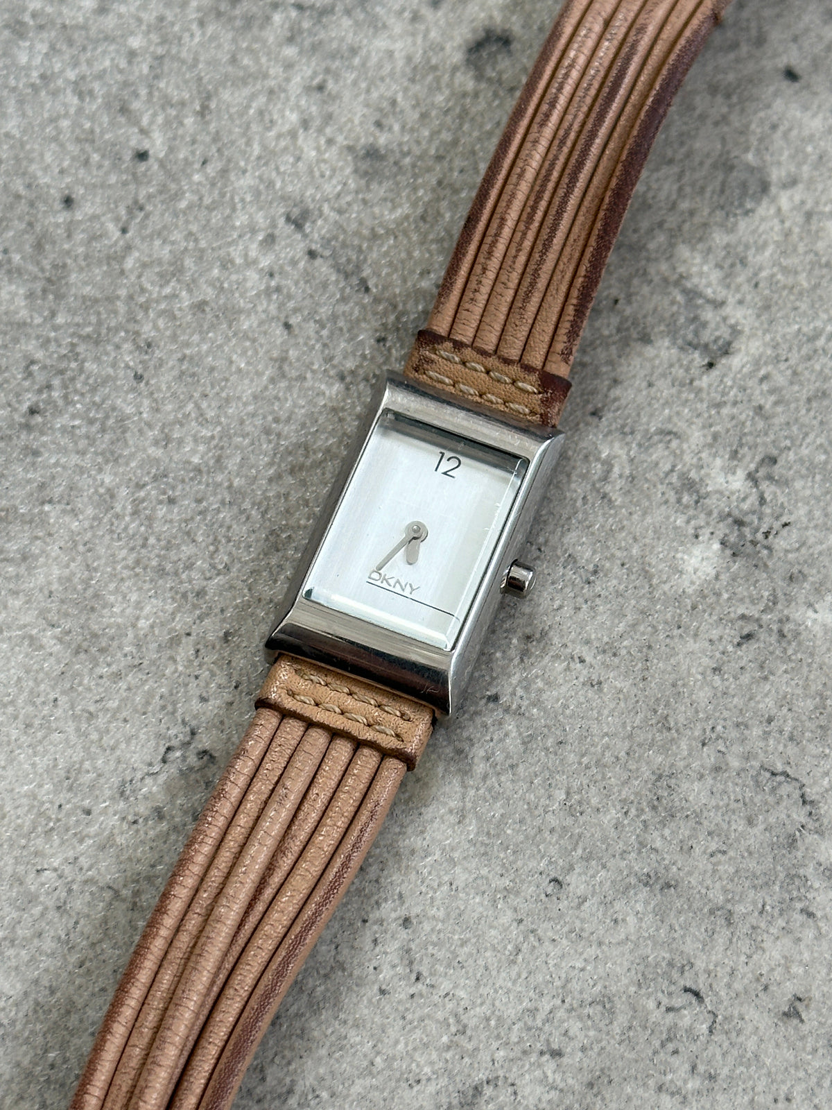 Donna Karran DKNY 2000s leather rectangular quartz watch with silver dial and black leather strap, vintage style timepiece.