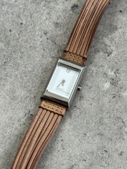 Donna Karran DKNY 2000s leather rectangular quartz watch with silver dial and black leather strap, vintage style timepiece.