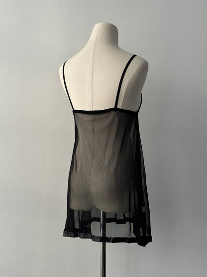 Vintage 2000s sheer sleeveless babydoll top, size small, featuring delicate fabric and vintage style details.