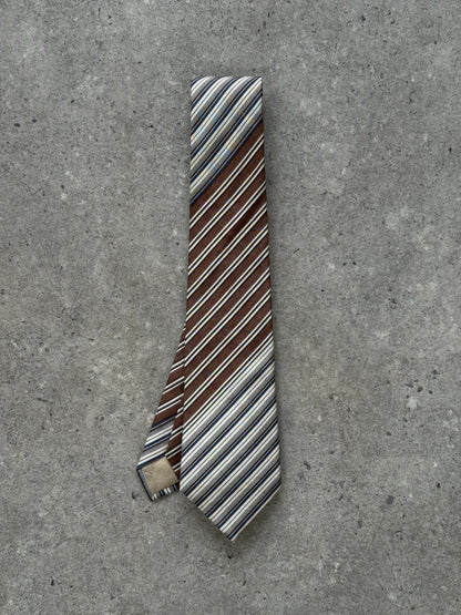 Christian Dior Monsieur 1990s pure silk striped tie, showing the elegant design and fabric detail in a close-up image.