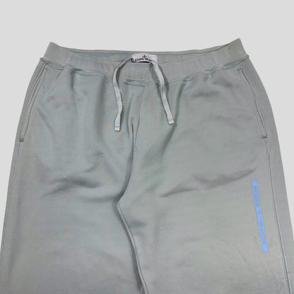 Stone Island AW22 Micrographic Spellout Logo Baby Blue Joggers - XL | XL, Blue