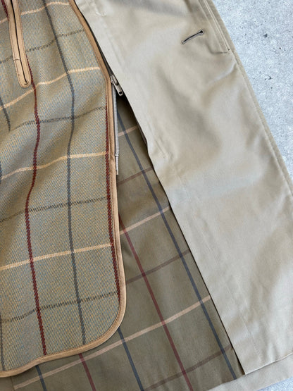 Burberry 1990s pure cotton high neck trench coat in beige, displayed on a hanger, showcasing classic design and high-quality fabric.