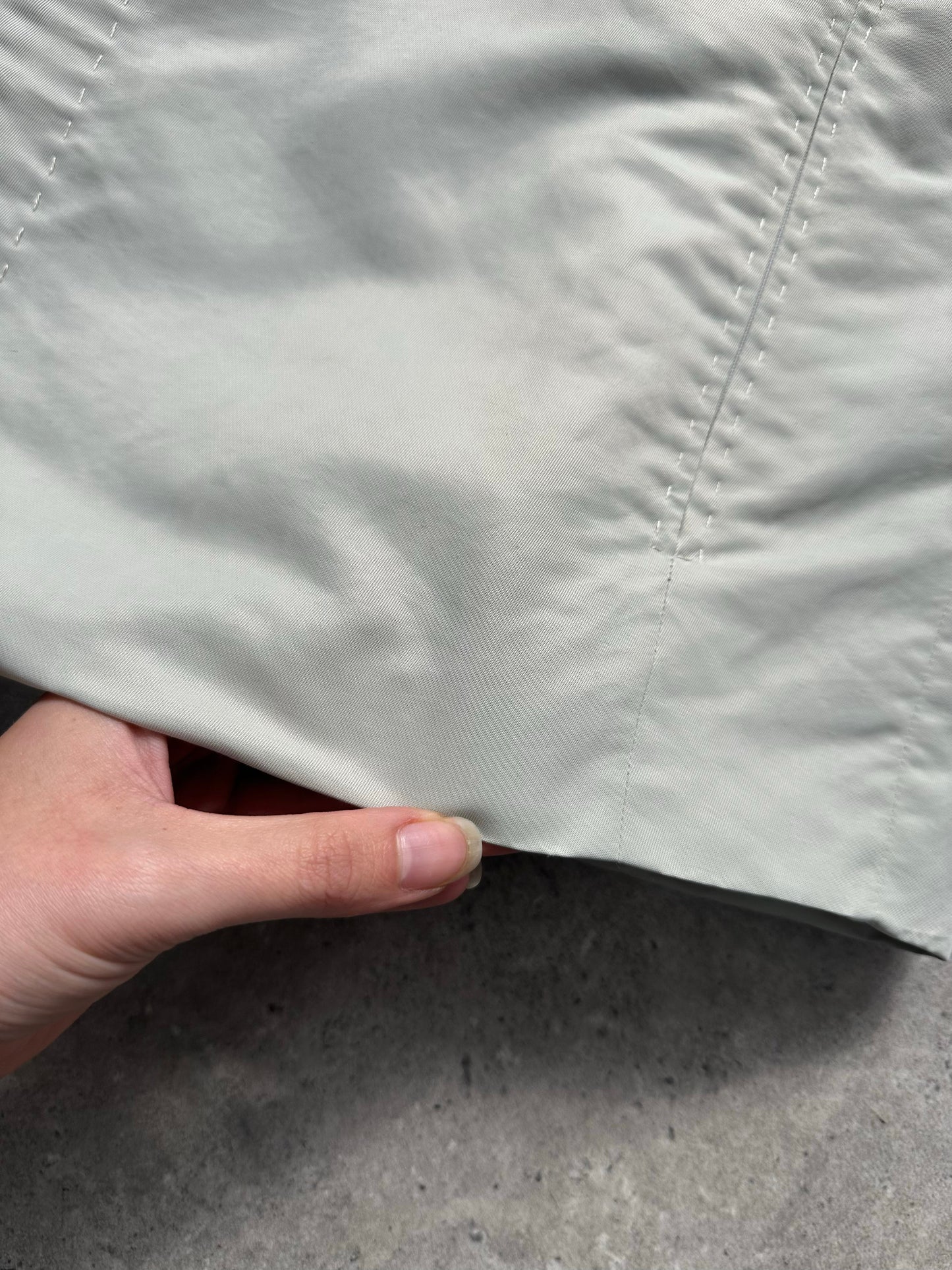 Gianfranco Ferre 1990s showerproof minimal jacket in size L, lightweight jacket with sleek design and waterproof fabric.