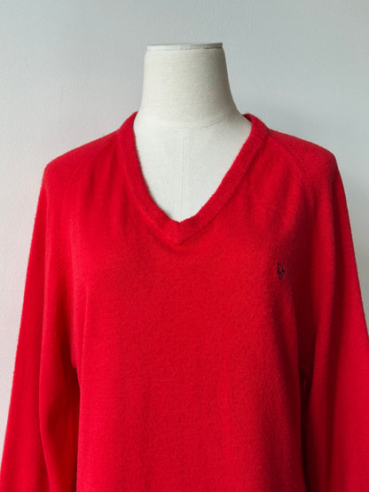 Christian Dior 1990s V-neck logo jumper in black, featuring the iconic Dior branding and a classic V-neck design.