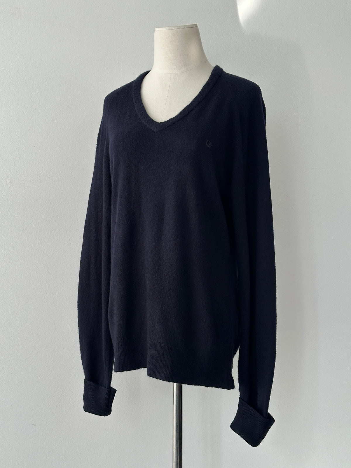 Christian Dior 1990s V-neck logo jumper in black, featuring the iconic Dior logo, size S-M, with a classic knit design.