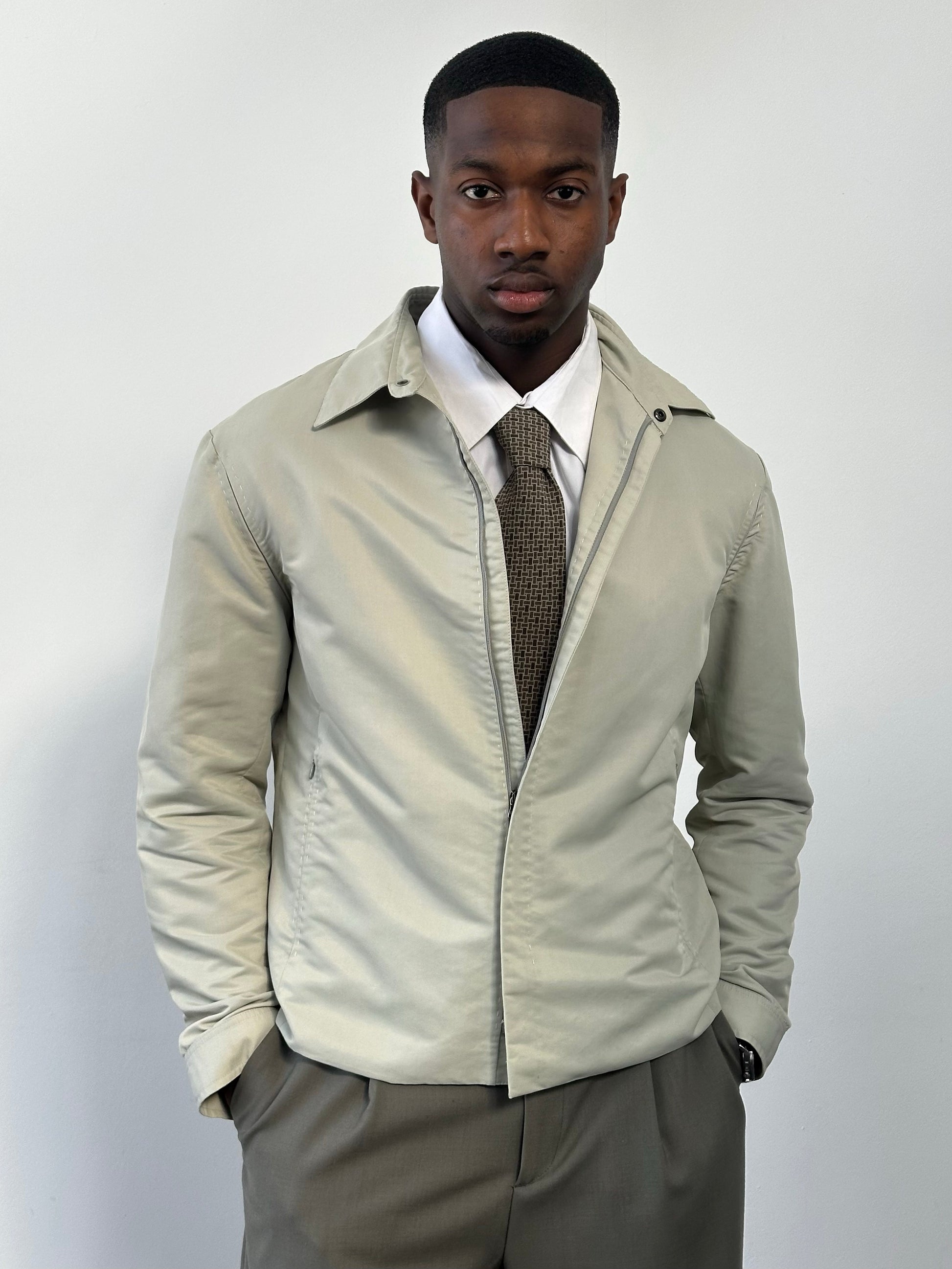 Gianfranco Ferre 1990s showerproof minimal jacket in size L, featuring a sleek design and lightweight fabric for casual wear.