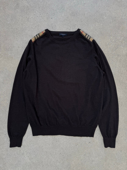 Burberry London 2000s wool knit jumper in size M, featuring classic check pattern and cozy, textured wool fabric.
