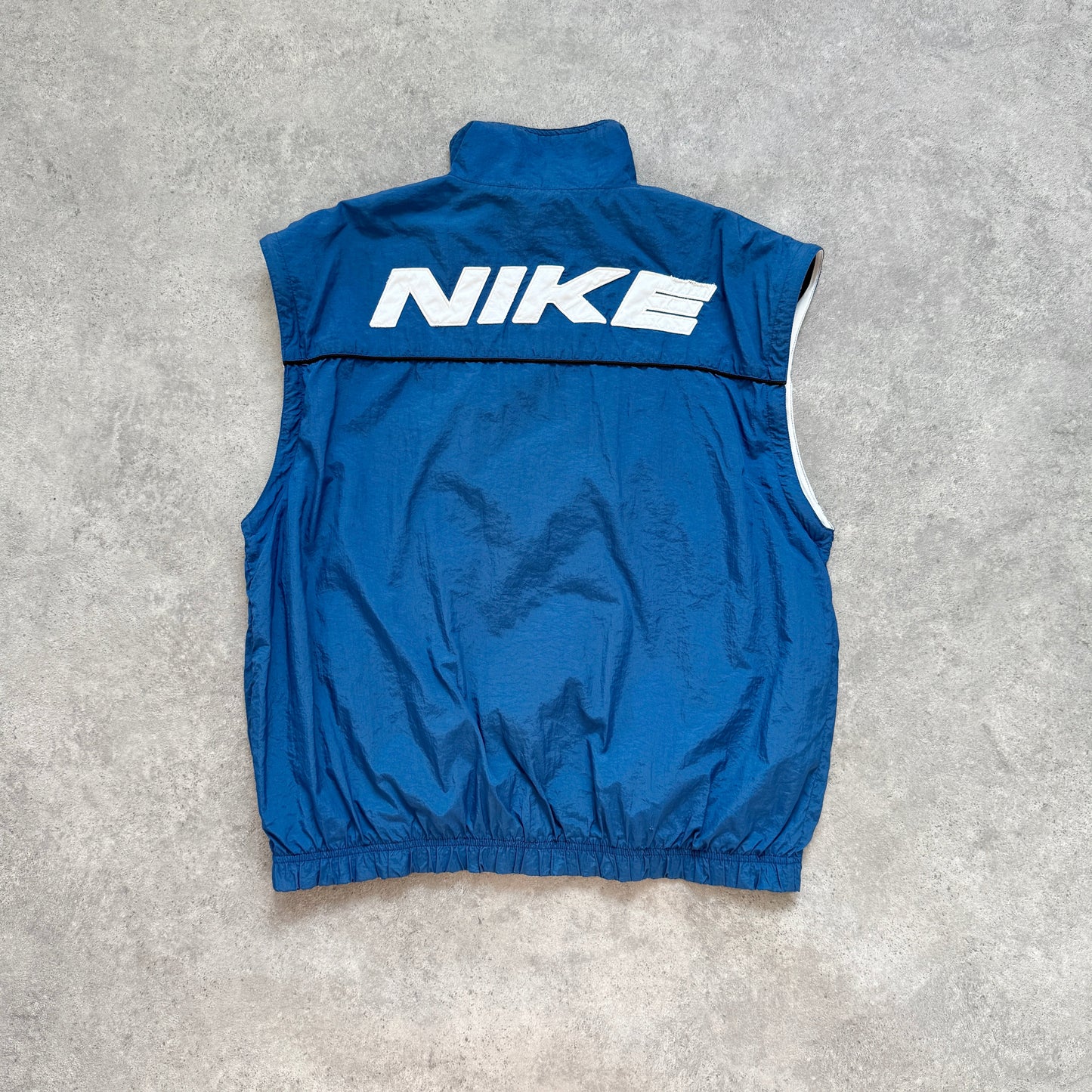 Nike 1990s lightweight convertible spellout shell jacket (M)