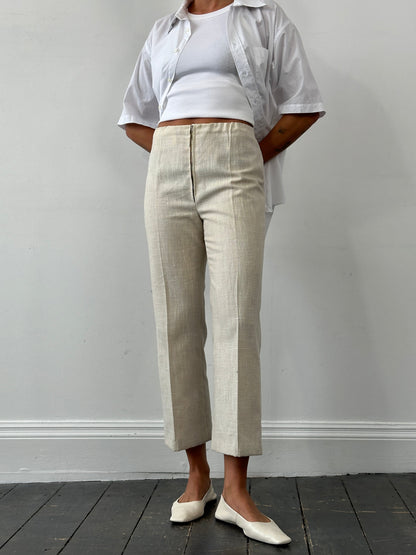 Vintage 1990s linen high waist cropped trousers, size W26, featuring a relaxed fit and classic high-rise design.