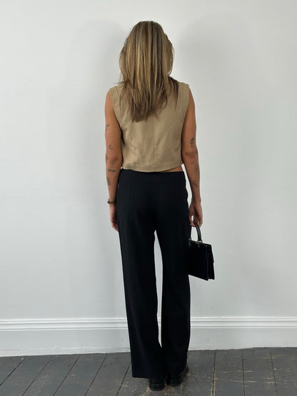 Armani Collezioni 1990s wool wide-leg trouser in size W30, shown on a hanger with a neutral background.