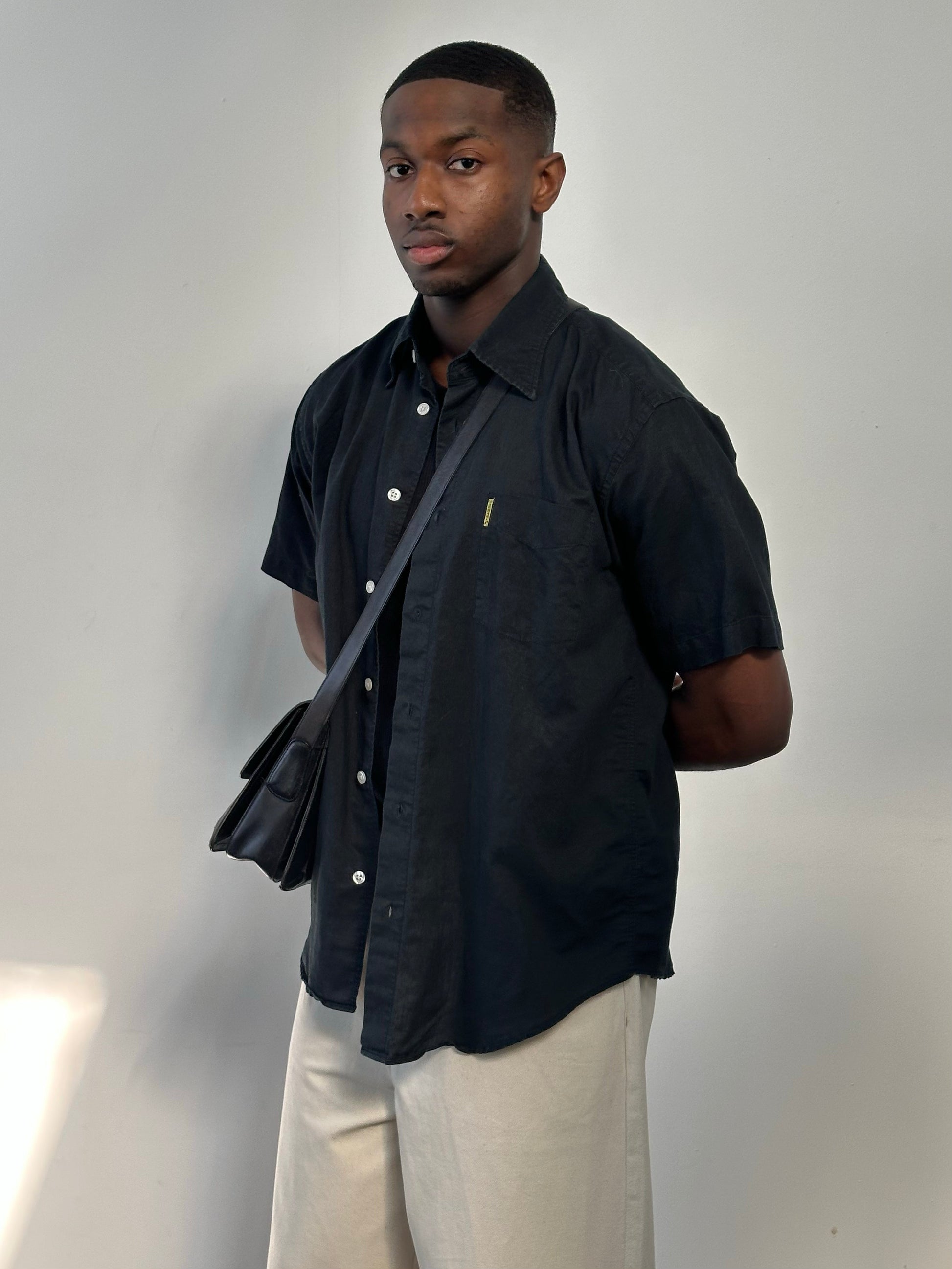 Armani Jeans 1990s pure cotton short sleeve shirt in size M, light-colored fabric with a classic collar and button-front design.