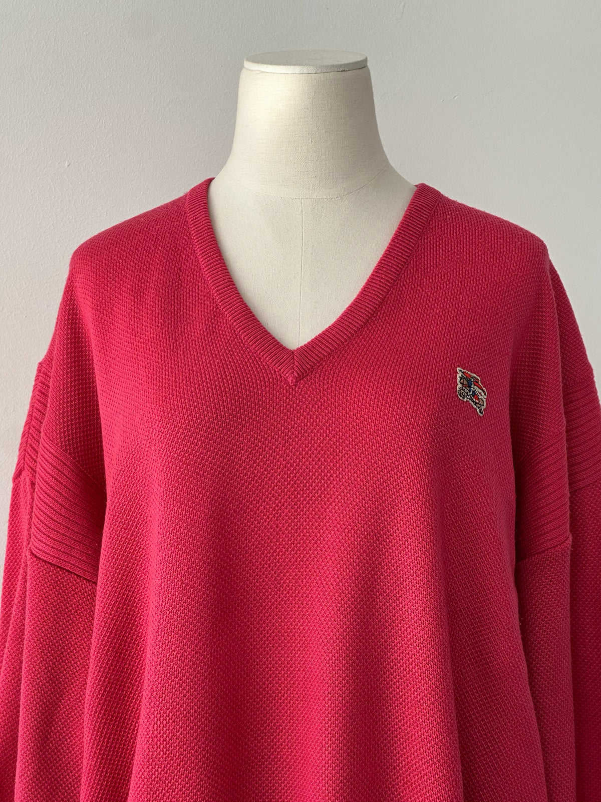 Burberry 1980s V-neck logo knit jumper in size L, British designer sweater with classic check pattern and brand logo detail.