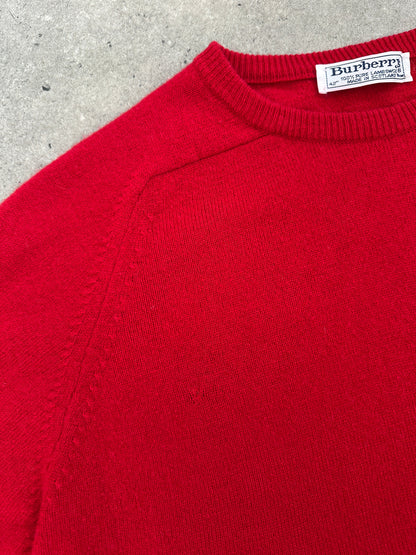 Burberry 1990s pure lambswool logo knit jumper in size M, featuring the iconic Burberry pattern and classic ribbed cuffs.